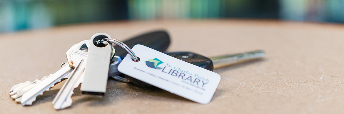 Car keys with a St. Charles Parish Public Library card on keychain