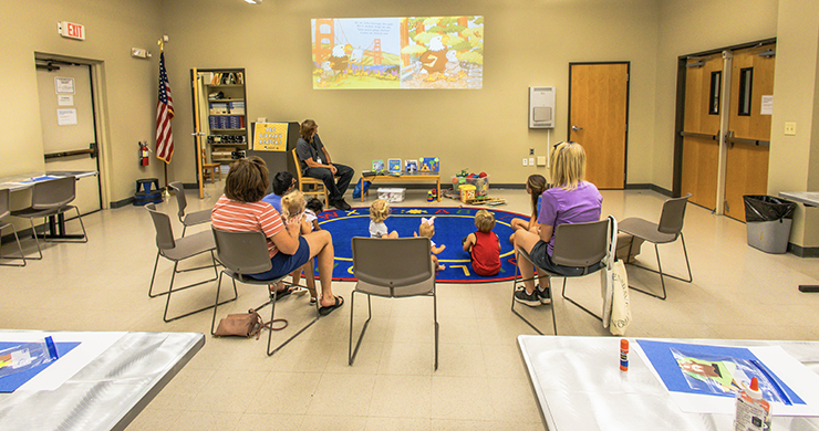 Babies and moms at a storytime event